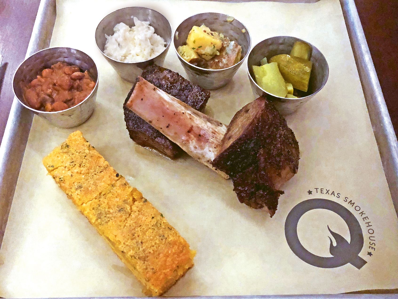 Short rib, cornbread and sides at Q Texas Smokehouse on the Norwegian Bliss. Photo by Tom Stieghorst