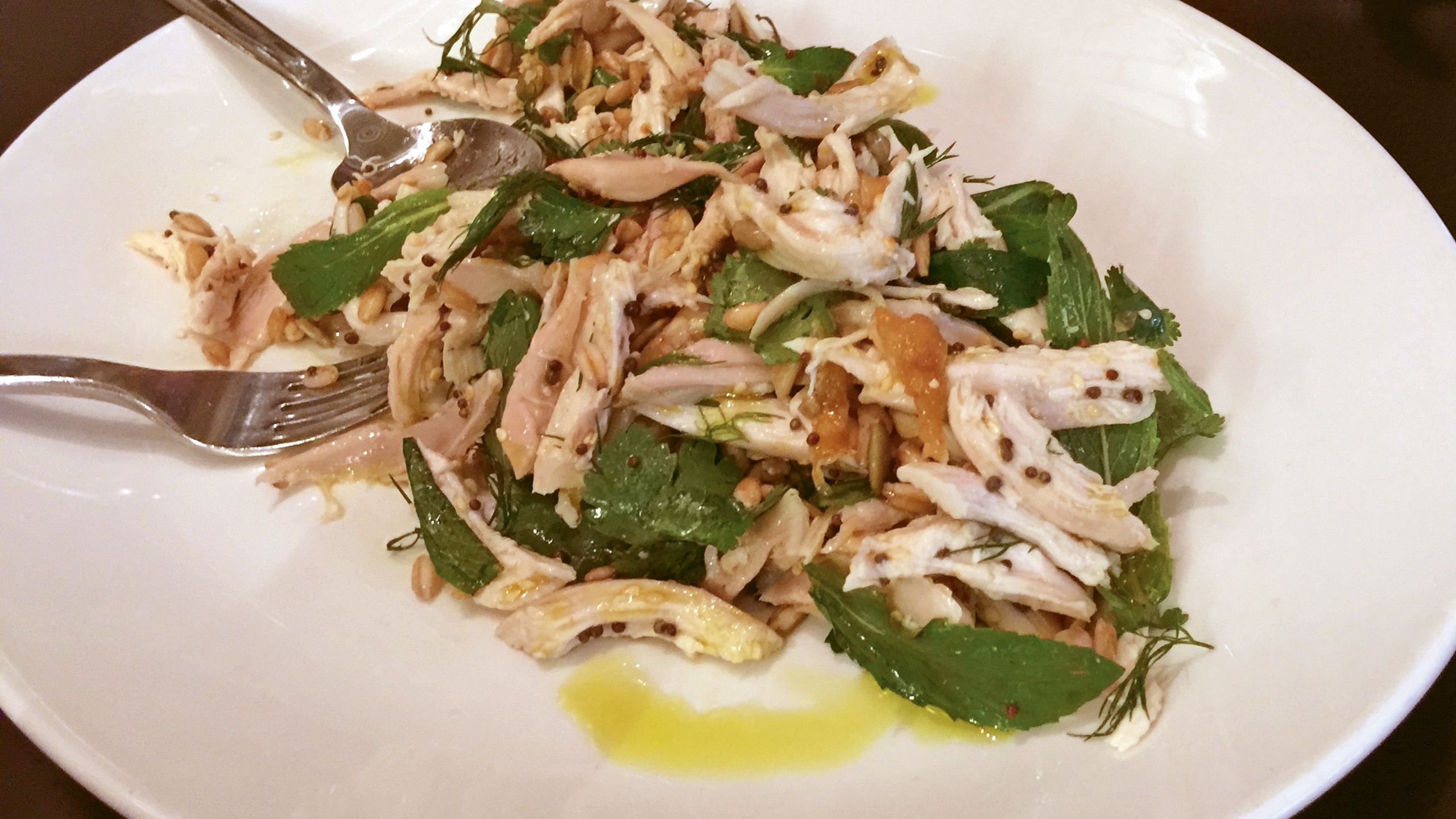 This rotisserie chicken salad with seeds and grains is heavy with tryptophan, which can help induce sleep on a long-haul flight. Photo by Robby Silk