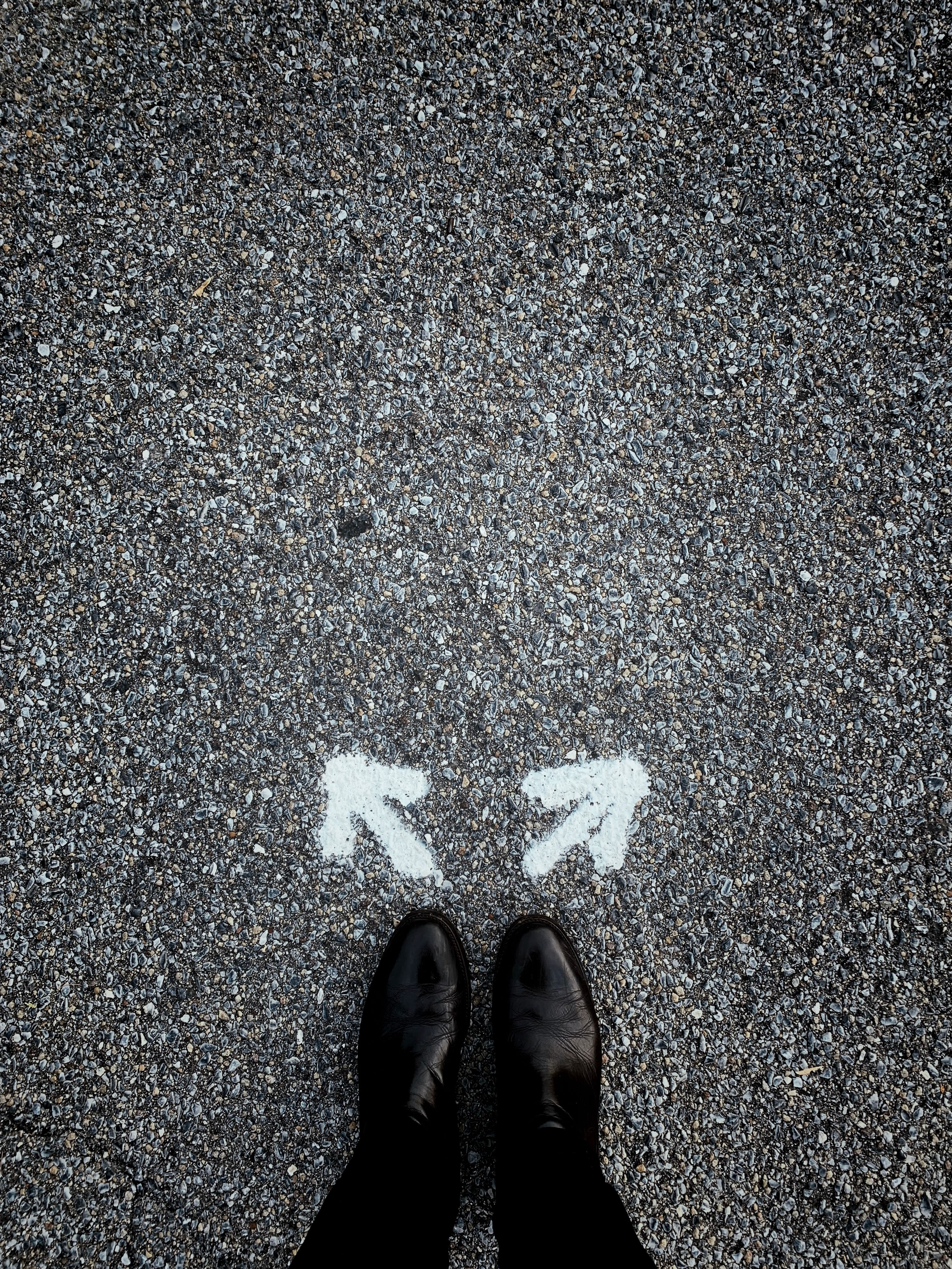 a person standing in the middle of a street