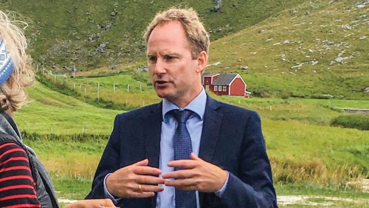 Remi Solberg, mayor of Vestvagoy at Haukland Beach. Solberg is working on solutions for the overtourism the Lofoten islands are experiencing. Photo by William Nash