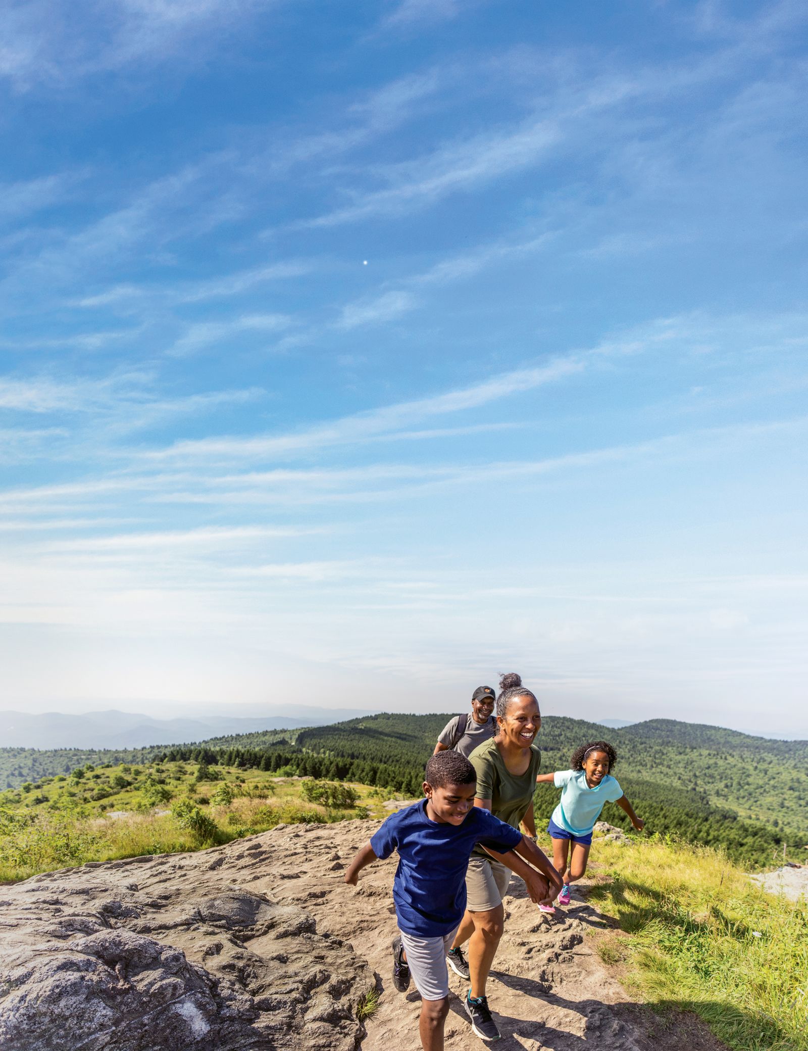 A family hiking in North Carolina’s Haywood County, which has enjoyed a surge in visits during the pandemic.