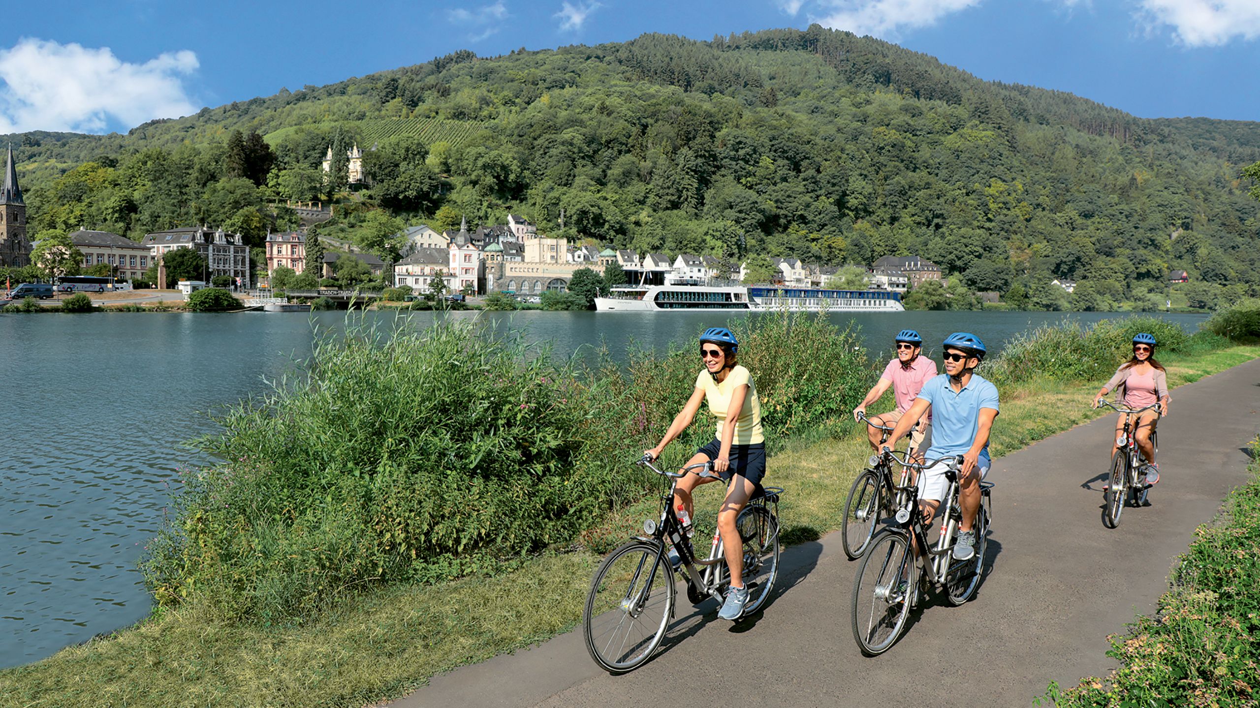 Passengers from an AmaWaterways ship take to the road on bicycles. River cruise ship loaner bikes have become commonplace since AmaWaterways launched the amenity in 2006. PHOTO BY MICHEL VERDURE/AMAWATERWAYS