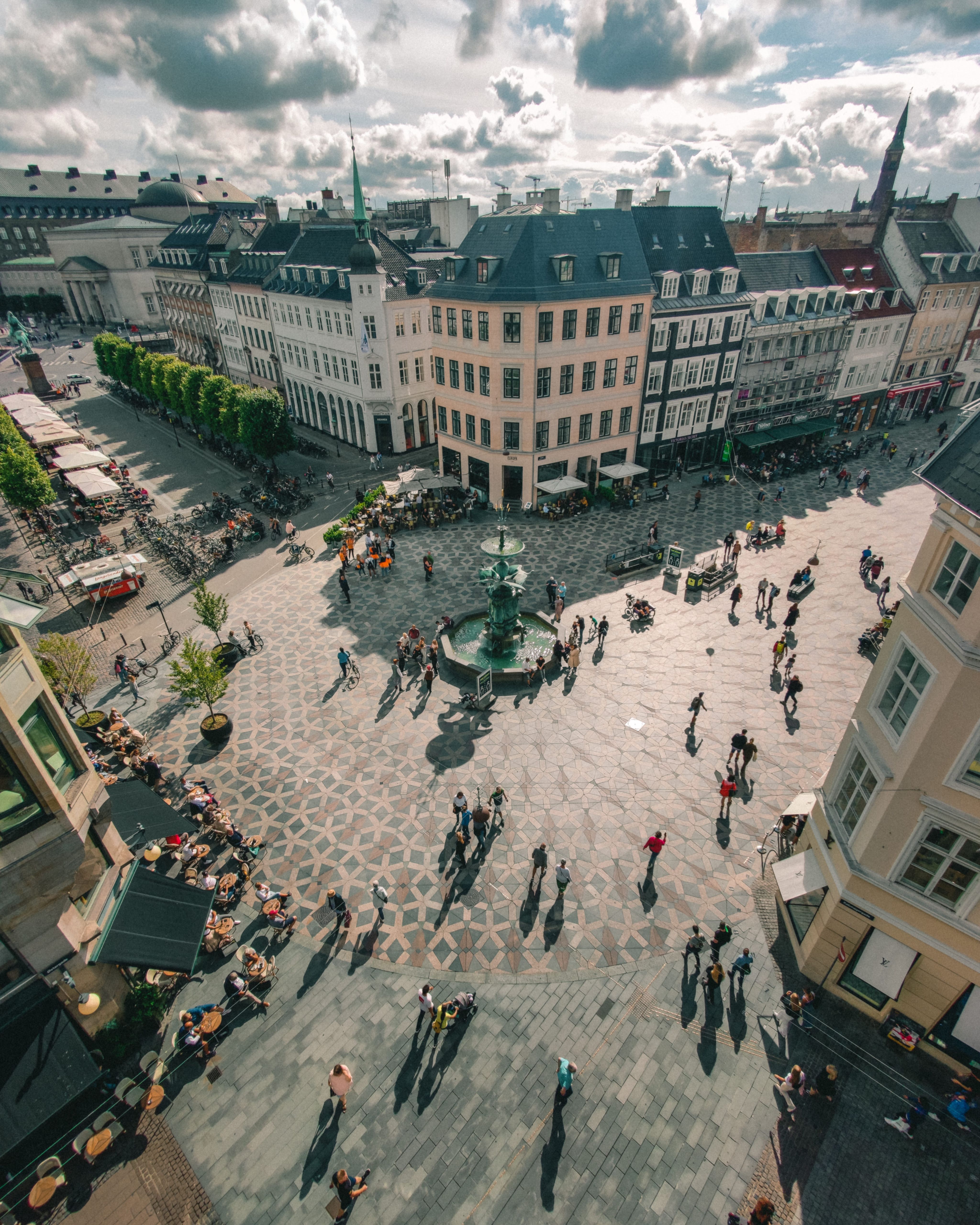 people walking on street near buildings during daytime
