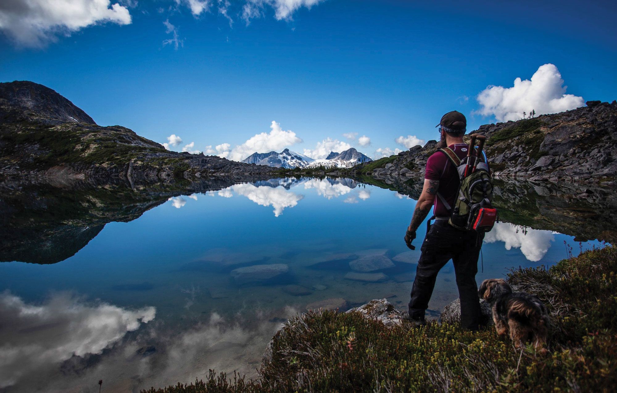 Skagway’s mayor, Andrew Cremata, pictured here hiking in the Skagway area, said that locals like him are mobilizing to get friends and family to come visit the cruise-dependent town this summer.