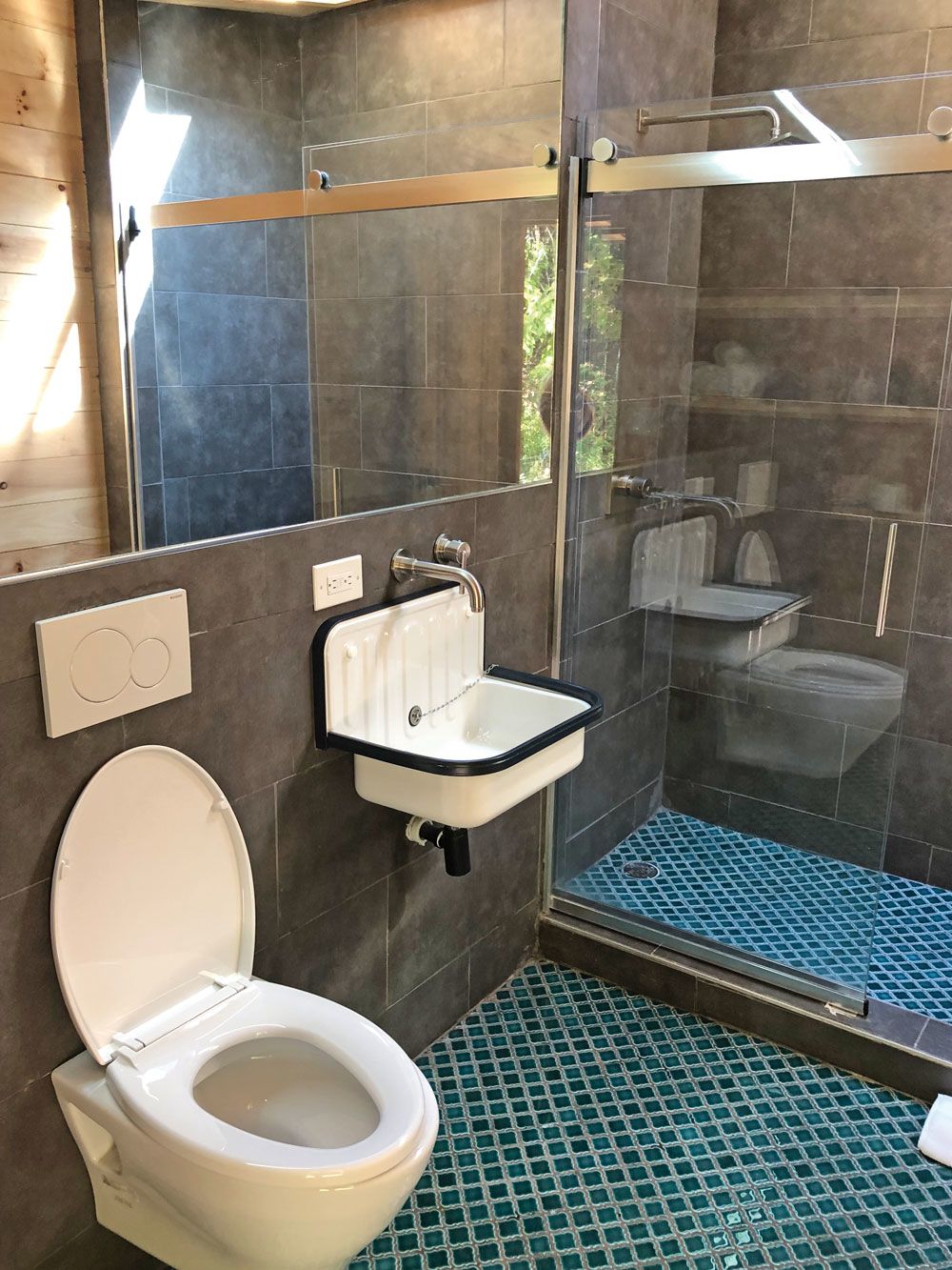 Each Lushna cabin has its own detached bathroom, which features an oversize shower with a skylight. (TW photo by Christina Jelski)