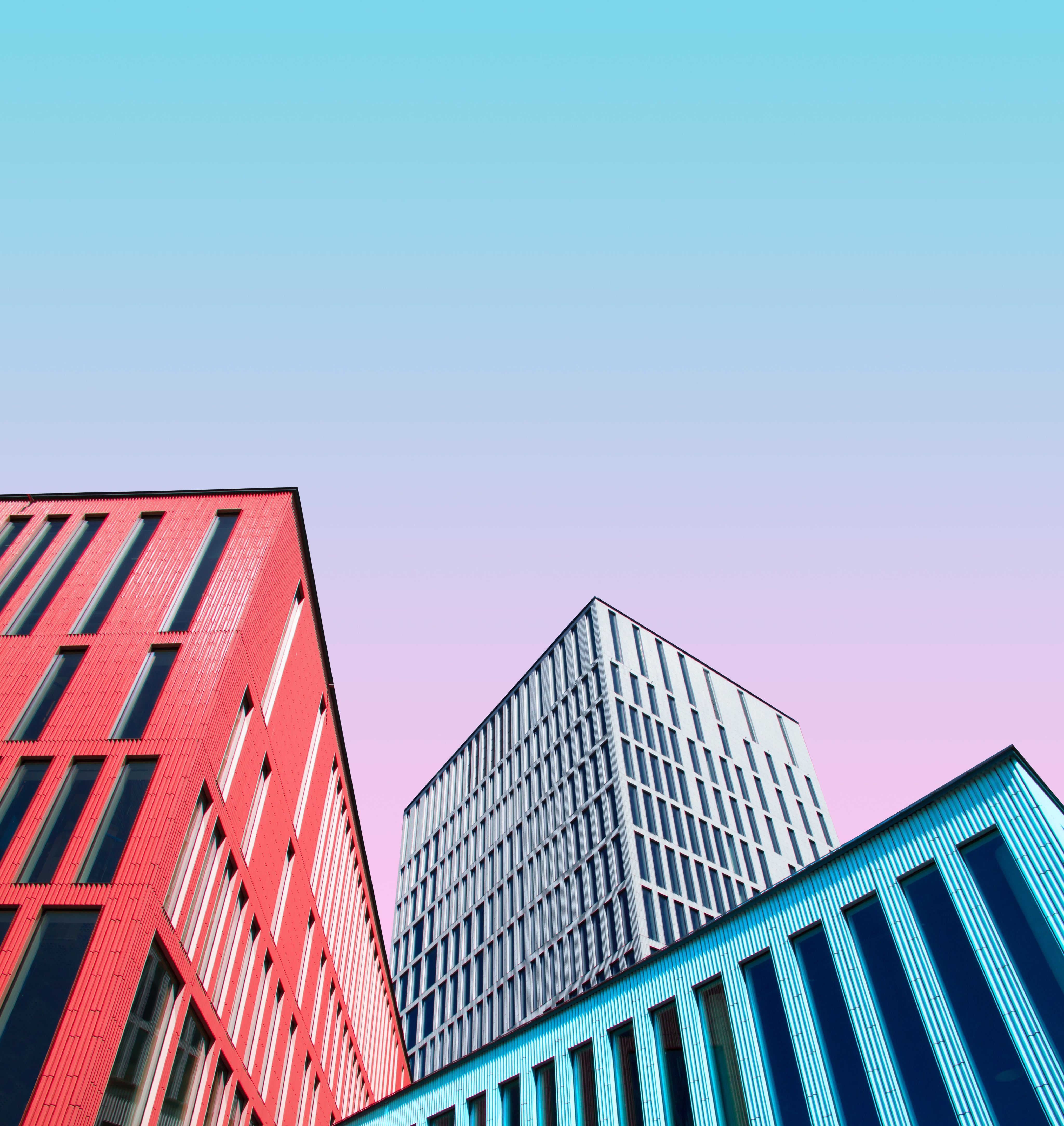 three multicolored buildings