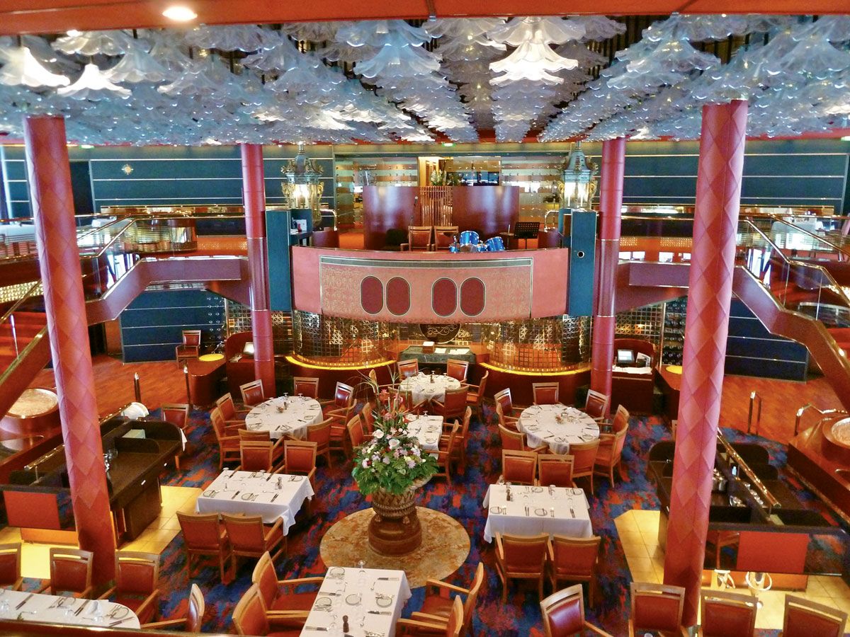 Like its sisters, the Veendam, which has since been renamed Aegean Majesty, featured a spectacular two deck, aft-situated dining room.