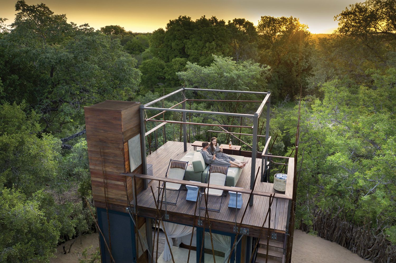 The roof deck and outdoor bed at AndBeyond’s Ngala Treehouse in South Africa. 