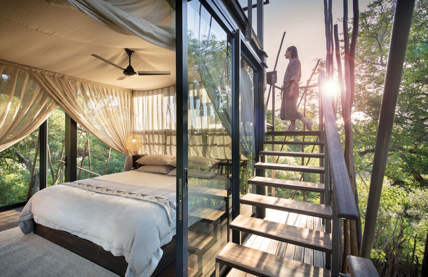 The indoor bedroom and staircase at the four-story treehouse.