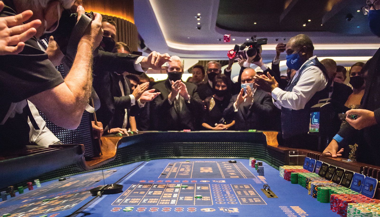Scenes from a Covid-challenged Las Vegas: players crowd around a craps table at the Circa Resort & Casino, which opened in October.